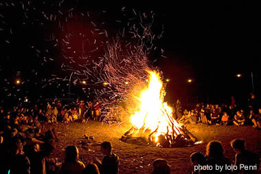 Singing Old Crow Medicine Show songs around the bonfire at the 2007 Green Man Festival, in Brecon, Wales.